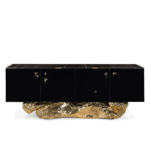 Bold black sculptural sideboard with asymmetrical silhouette and molten gold base – Angra by Boca do Lobo