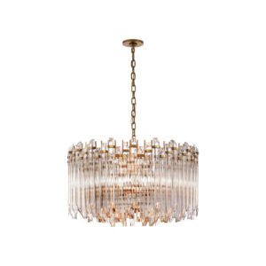 Wide round chandelier in hand-rubbed brass with clear acrylic rods — modern glamor meets classic precision