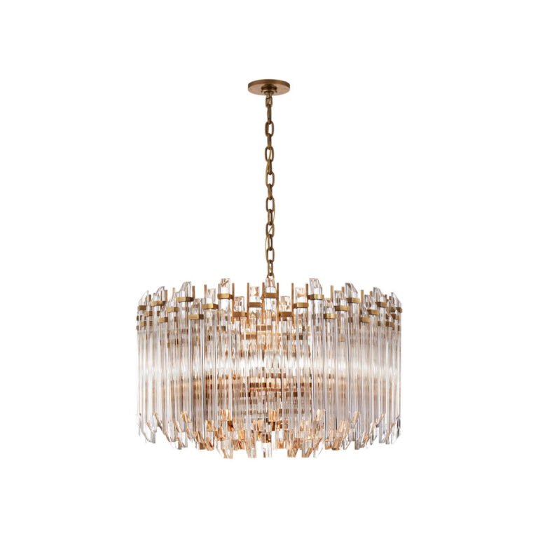 Wide round chandelier in hand-rubbed brass with clear acrylic rods — modern glamor meets classic precision