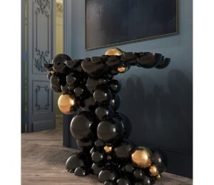 Newton Console Side View – Sculptural Gold and Black Spheres in Luxurious Architectural Form