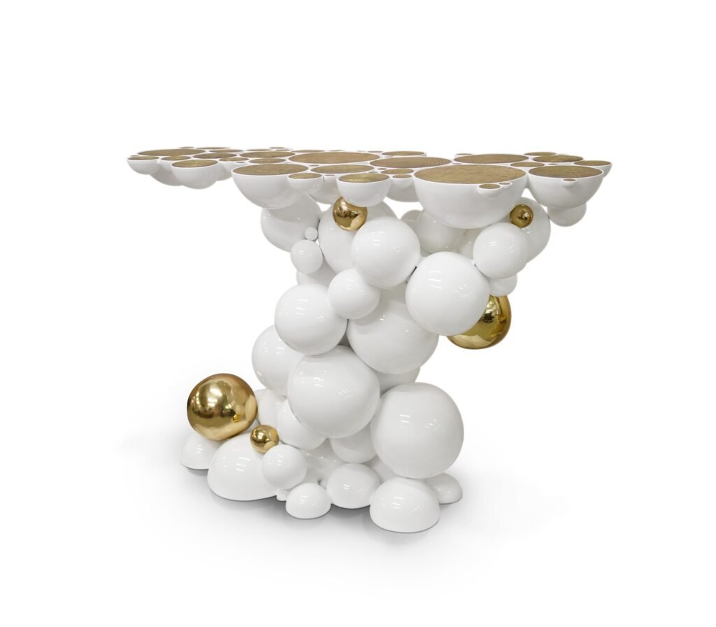 Newton Console by Boca do Lobo in white lacquer with gold-plated brass spheres and textured brass top.